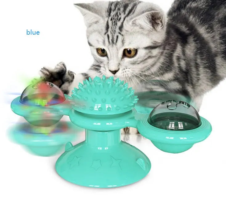 Cat rotating windmill toy with suction base, two transparent bins, blue and yellow-green TPR body.