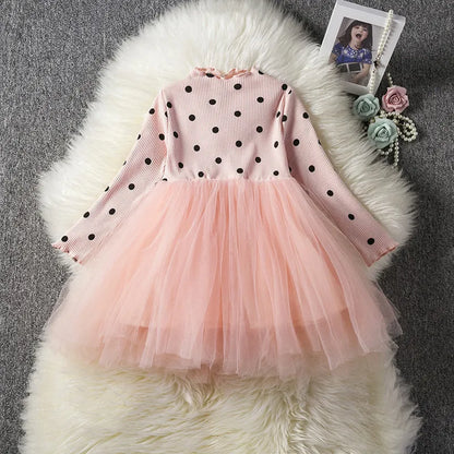 Baby girl's long sleeve black tutu lace dress with lace trim, shown on a hanger.