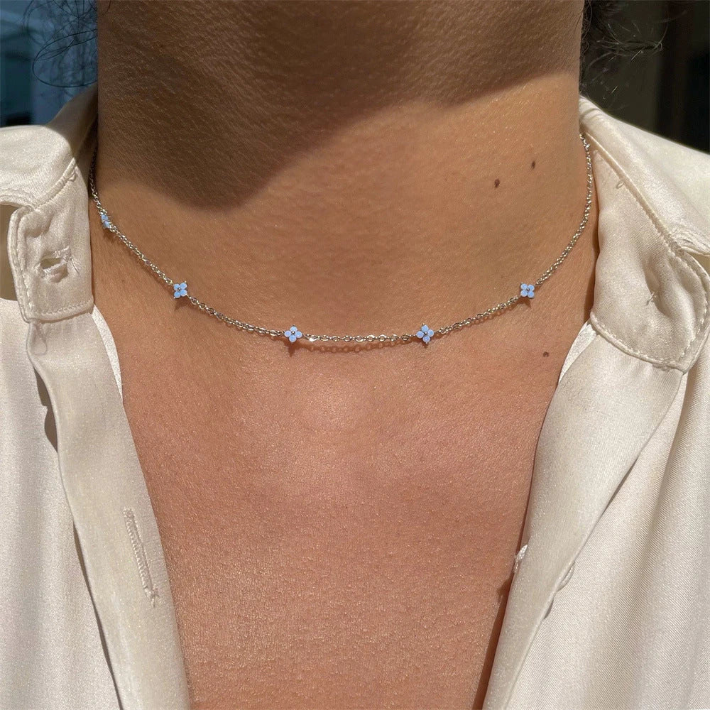 Stylish and versatile blue flower necklace with adjustable chain and vibrant floral accents, perfect for vacations, beaches, and everyday wear.