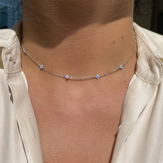 Stylish and versatile blue flower necklace with adjustable chain and vibrant floral accents, perfect for vacations, beaches, and everyday wear.