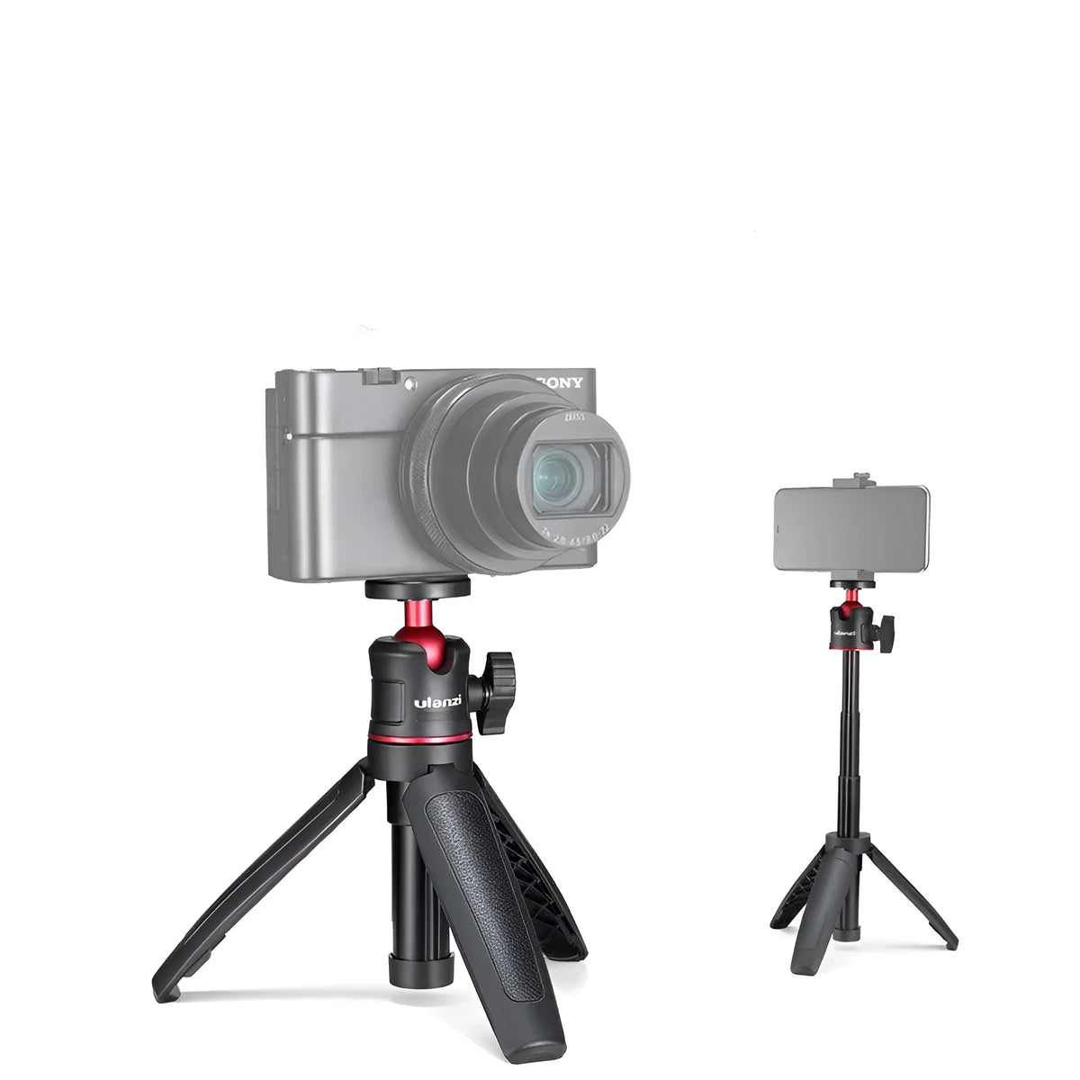 Compact black red and white phone tripod selfie stick stand extended next to a mobile phone.