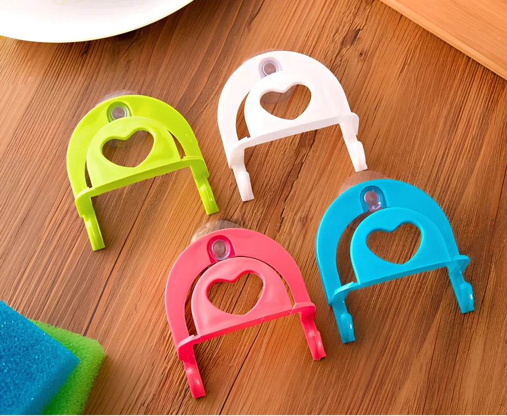 Plastic hook sponge storage rack with suction cup attachment in multiple colour options