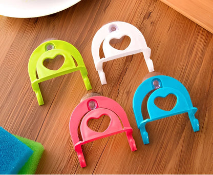 Plastic hook sponge storage rack with suction cup attachment in multiple colour options
