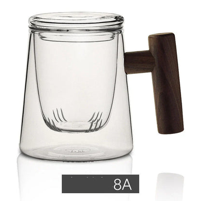 Premium glass tea infuser cup with wooden handle, offering a unique tea-water separation system and temperature-resistant construction for a refined tea experience.