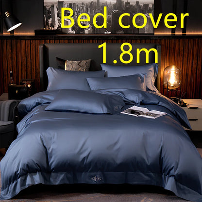 Four-piece quilted cotton bed set in royal blue, showing 200x230 cm cover and 48x74 cm pillowcases for 1.5m bed