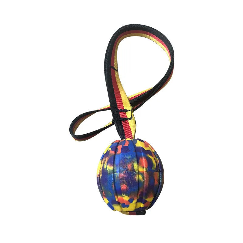 Camouflage and yellow EVA foam floating dog ball with knotted tetherball design.