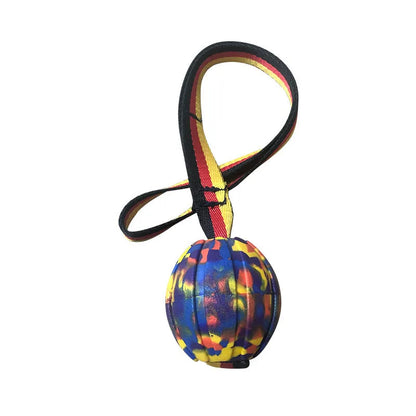 Camouflage and yellow EVA foam floating dog ball with knotted tetherball design.