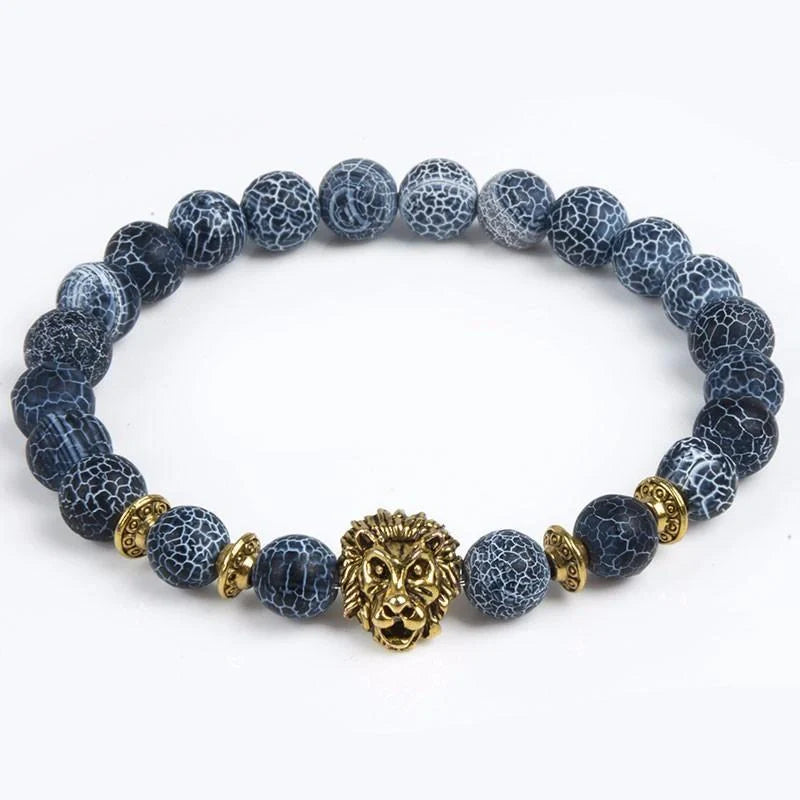 Carved stone bracelet featuring a powerful lion design, meant to enhance confidence and style.