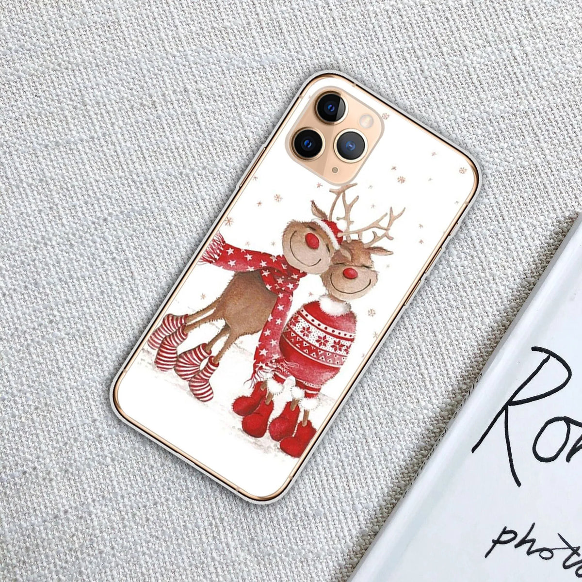 Christmas transparent phone case with festive design for iPhone models, available in eight styles.