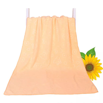 Bear embossed microfiber bath towel in vibrant colors, quick-drying and soft