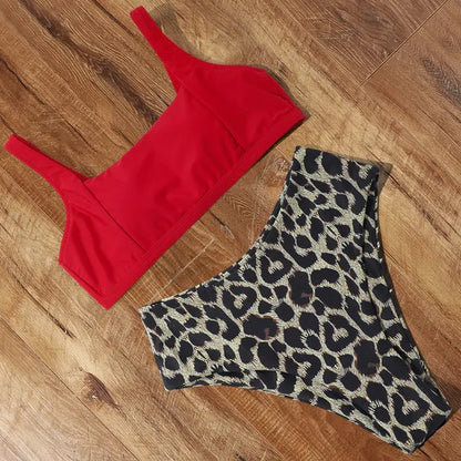 Women's leopard print high waist bikini swimsuit set on a mannequin, showing bra and briefs.
