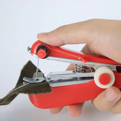 Small blue hand-held manual sewing machine showing stainless steel components and compact 11cm design