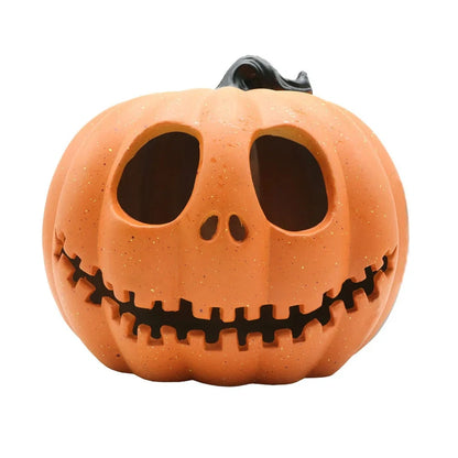 Halloween pumpkin lantern with hollow-out skull design measuring 23 by 19 centimetres