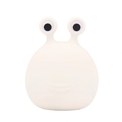 White cartoon slug night light with touch activation and USB power connection