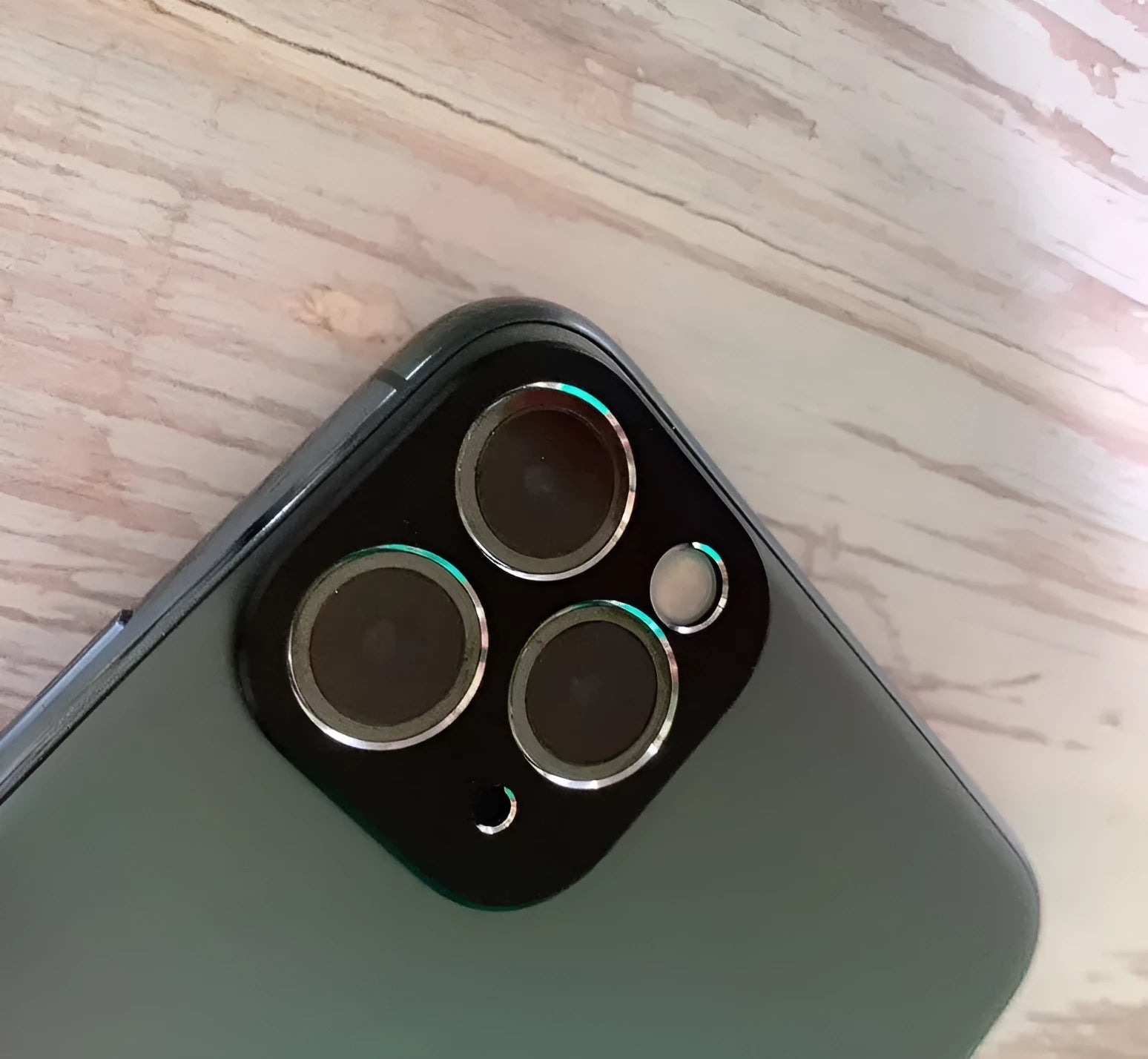 Metal lens protection ring for iPhone 11 and 11 Pro back cover, shown in multiple colour options.