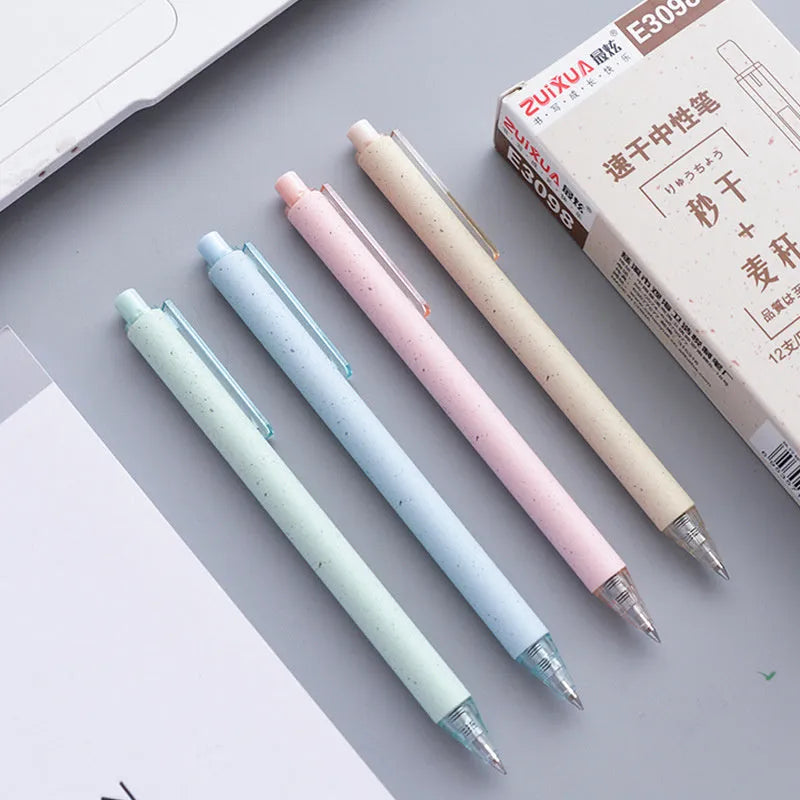 Set of 12 coloured 0.5mm gel pens with black ink and press-button tops on a white surface.