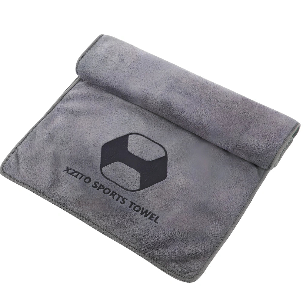 Blue sports sweat absorbent towel with 100x30cm dimensions and polyester-nylon fabric for athletic use