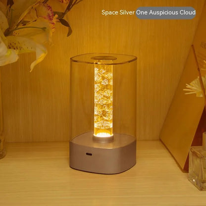 Rose Gold LED touch atmosphere lamp with abstract pattern on bedside table