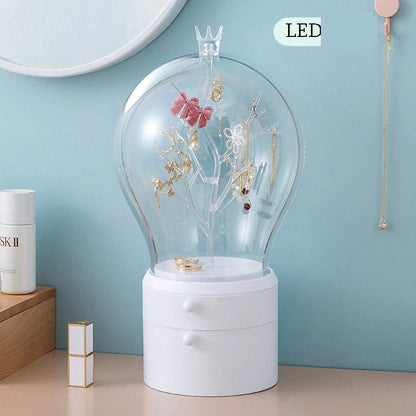 Rotating jewelry organizer with LED lights and USB charging for necklaces, earrings, and makeup storage