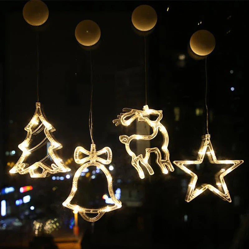 Decorative battery-powered LED chandelier lights with holiday-themed designs like Santa, snowmen, and stars