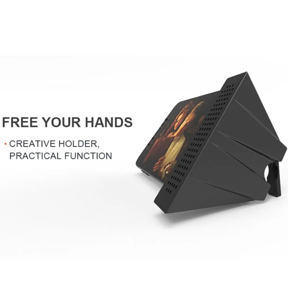 Portable black ABS plastic phone amplifier bracket holding a smartphone on a desk.