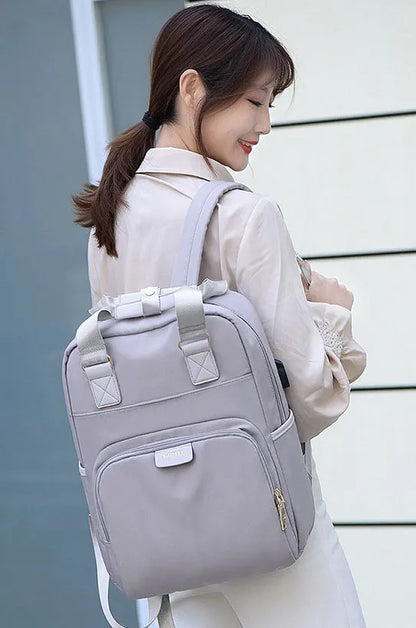 Oxford cloth shoulder fashion backpack, medium 20-35L, 15.6 inch size option, black or pink, multi-pocket interior