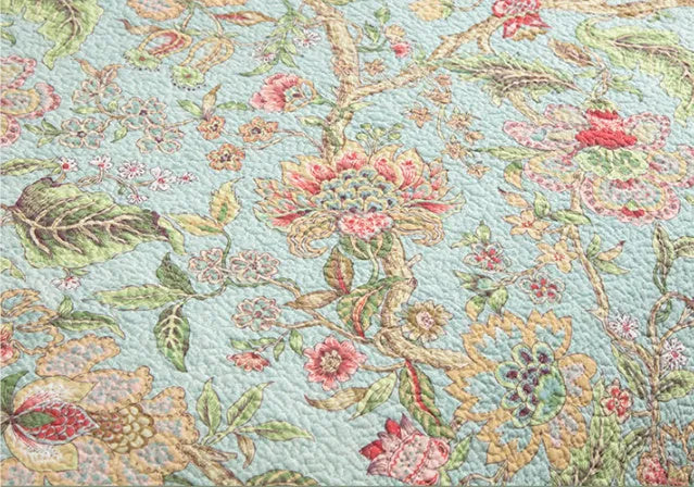 Blue American floral pattern cotton bedspread measuring 230x250cm with reactive printed bird and flower design