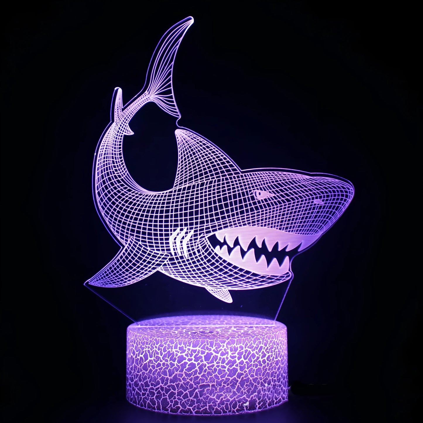Shark-shaped 3D acrylic LED table lamp with touch control and remote on a wooden surface.