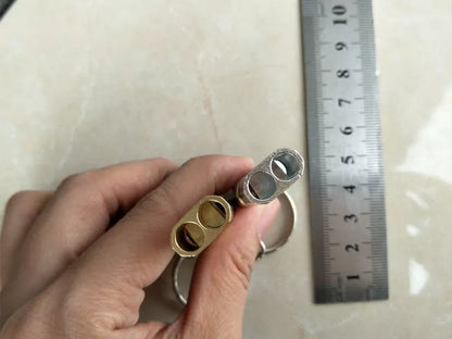 Outdoor survival whistle with keychain in gold and silver options