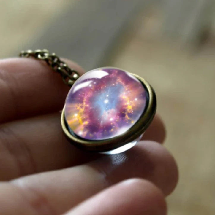Mesmerizing double-sided galaxy pendant necklace in various celestial patterns and colors