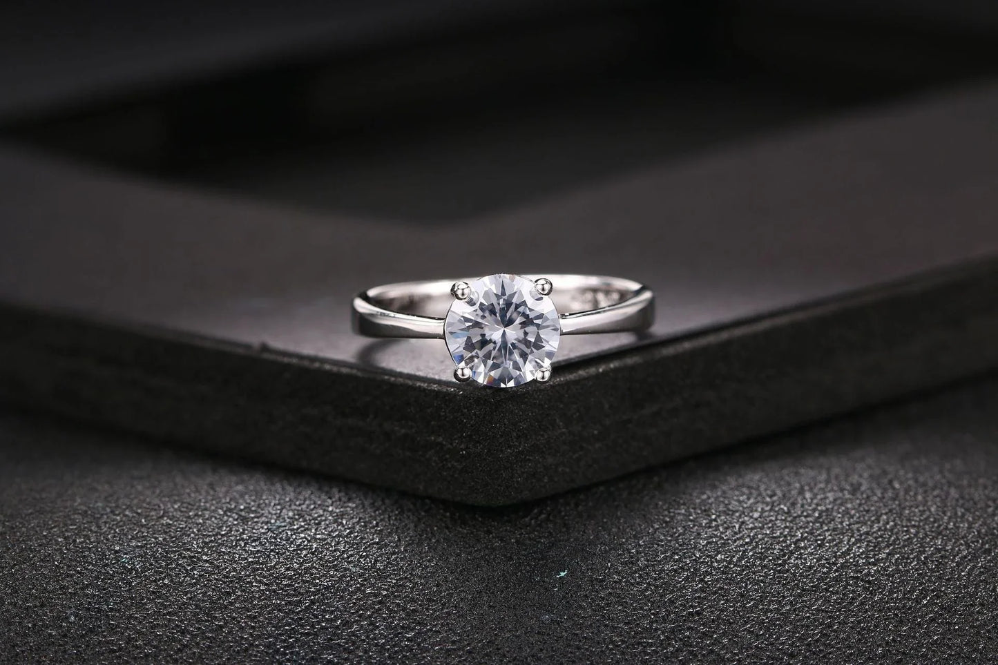 Exquisite rose gold and zircon cocktail ring with intricate geometric design and sparkling zircon gemstones