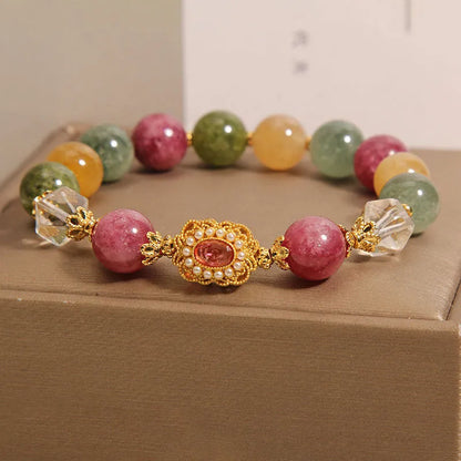 Jade colour tourmaline round bead bracelet for women with alloy inlay and rhinestones on a pearl crystal base.