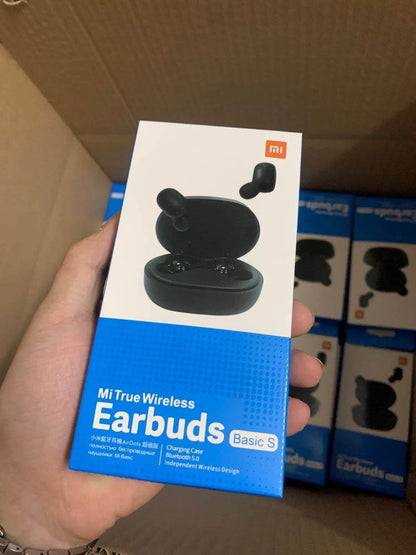 Black AirDots true wireless earbuds with charging case, showing 7.2mm drivers and three earplug sizes