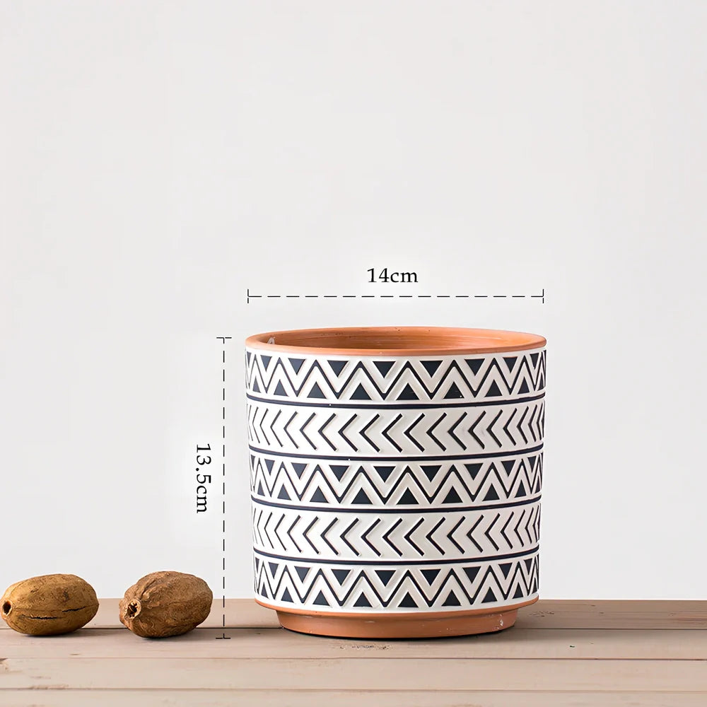 White ceramic geometric flower pot with Nordic design in three sizes for indoor plants