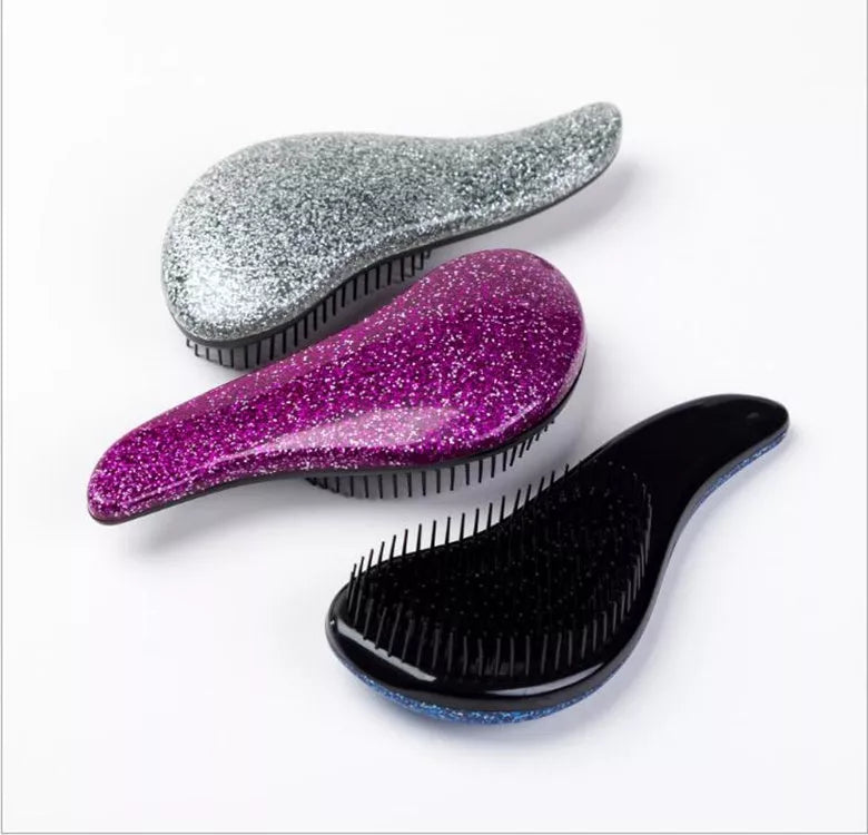 Massage Comb in various colors for gentle hair detangling and scalp stimulation
