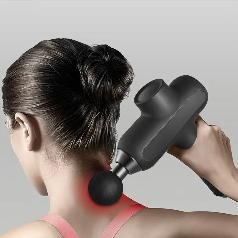 Black cordless electric muscle massager with six different coloured attachment heads on a white background.