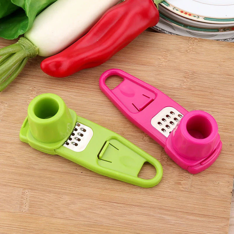 Garlic masher and seasoning grinder in rose red and light green, eco-friendly materials