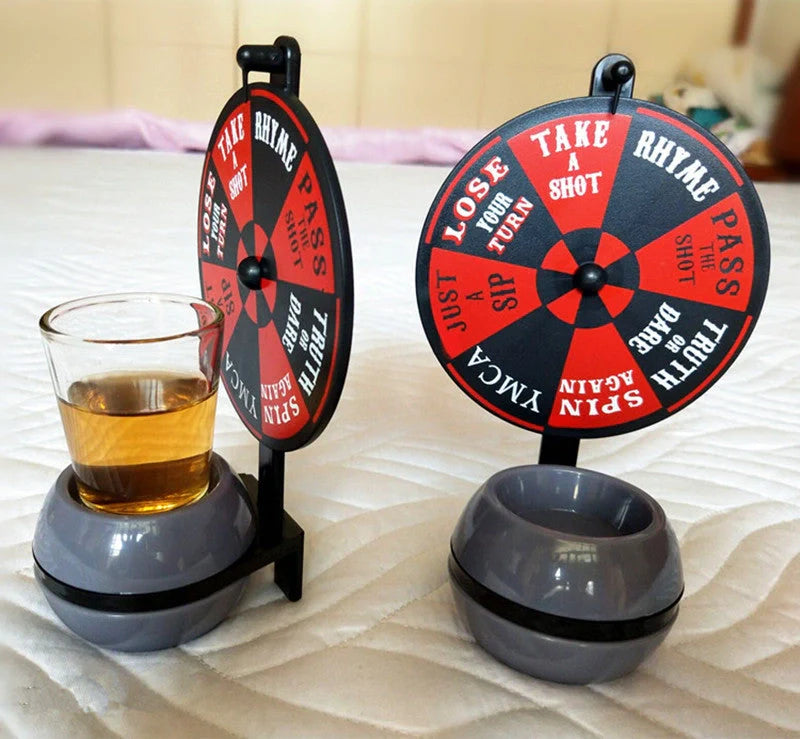 Rotatable drinking game set with plastic turntable and glass wine glass for party fun