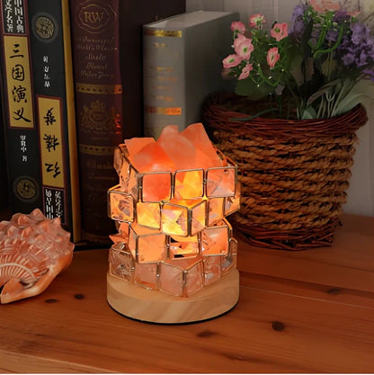 Himalayan salt lamp with wooden base and dimmable switch showing pink and orange salt rocks