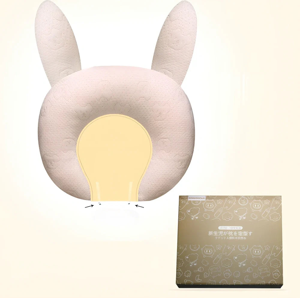 White baby pillow with latex core measuring 30x40cm for infant head support