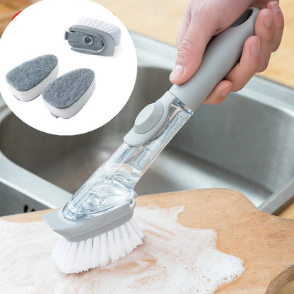 Long-handled kitchen cleaning brush with removable head, designed for efficient and hygienic scrubbing of dishes, bowls, and surfaces.