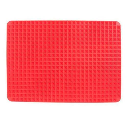 Red silicone pyramid grid cooking mat on a kitchen counter