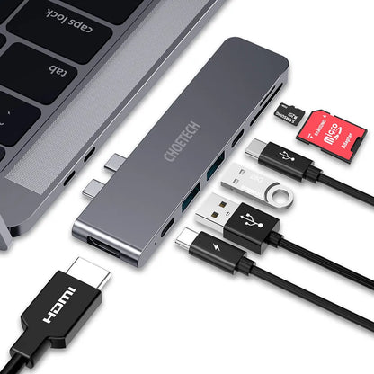 Black aluminium alloy USB C adapter with SD card slot, Thunderbolt 3, HDMI, and USB ports