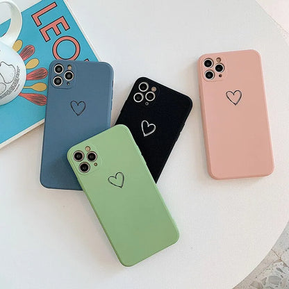 Silicone iPhone case in solid colours like black, green, pink, and white, showing TPU material and slim back cover design
