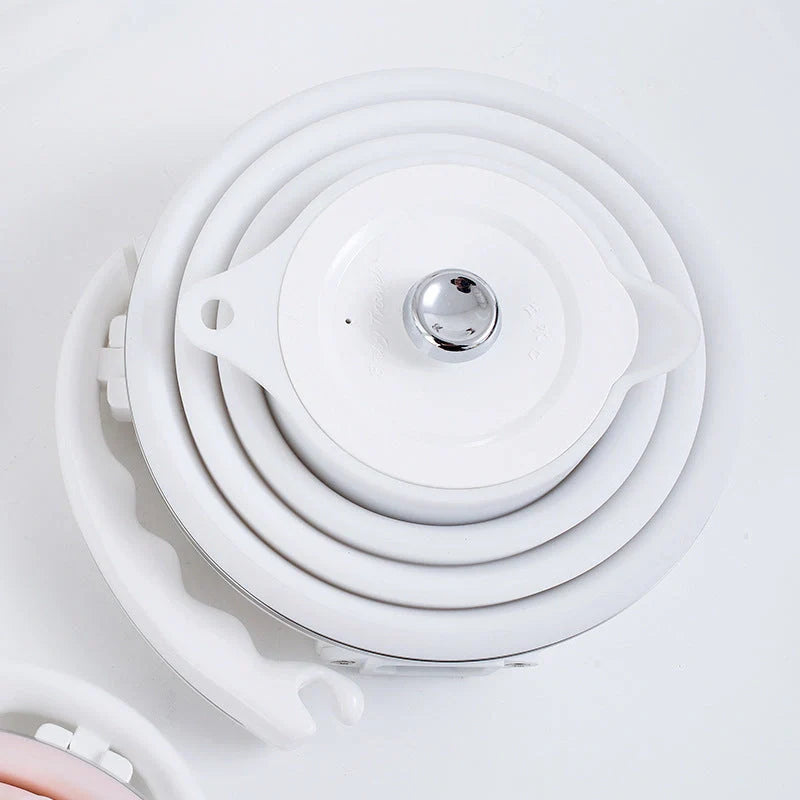 Foldable Electric Kettle in white, blue, and pink colors with UK, US, and EU plugs