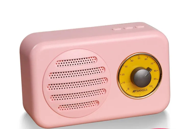 Portable Bluetooth wireless speaker with FM radio in wood grain finish