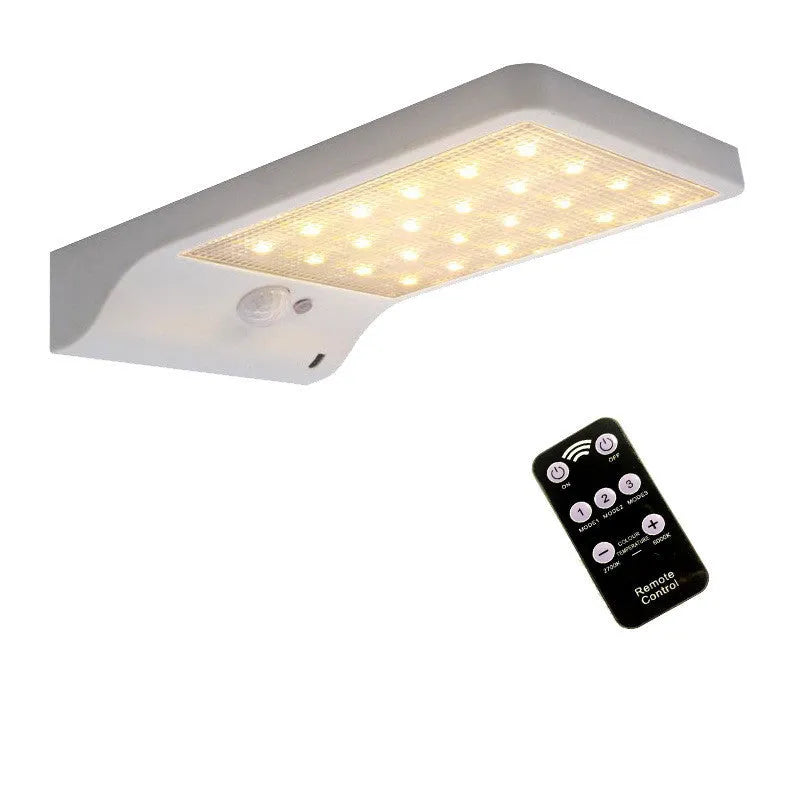 Black and white outdoor solar garden light with IP65 waterproof rating for courtyard and balcony lighting