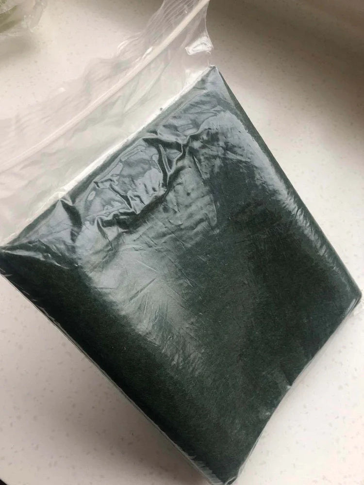 Biodegradable grass seed mat unrolled, 20cm x 300cm size, showing wind-proof fabric for soil consolidation and moisture retention in garden use