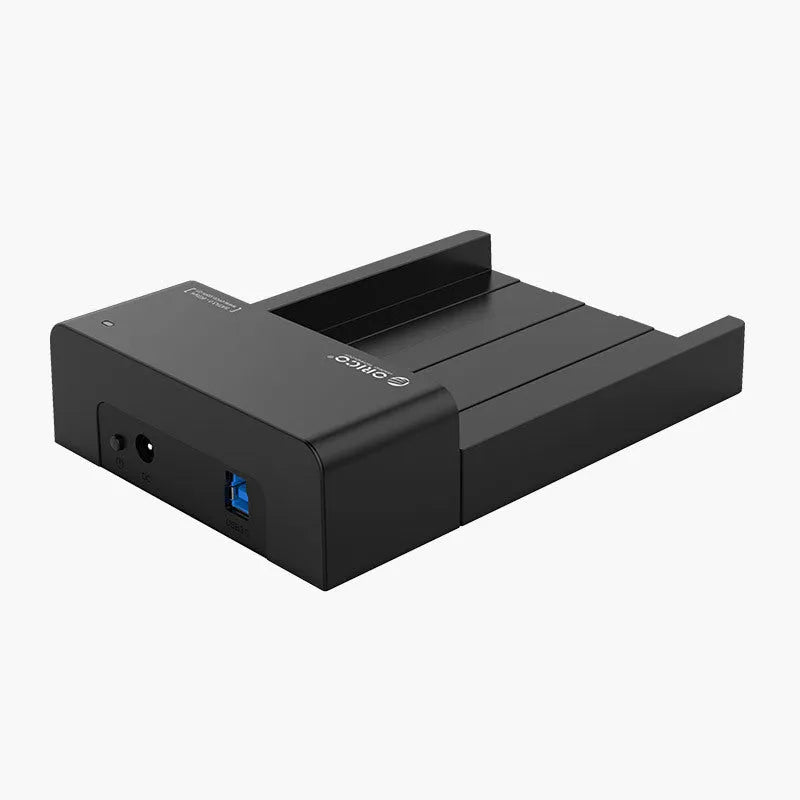 Black universal 2.5-inch SATA hard disk box with data cable for portable external storage