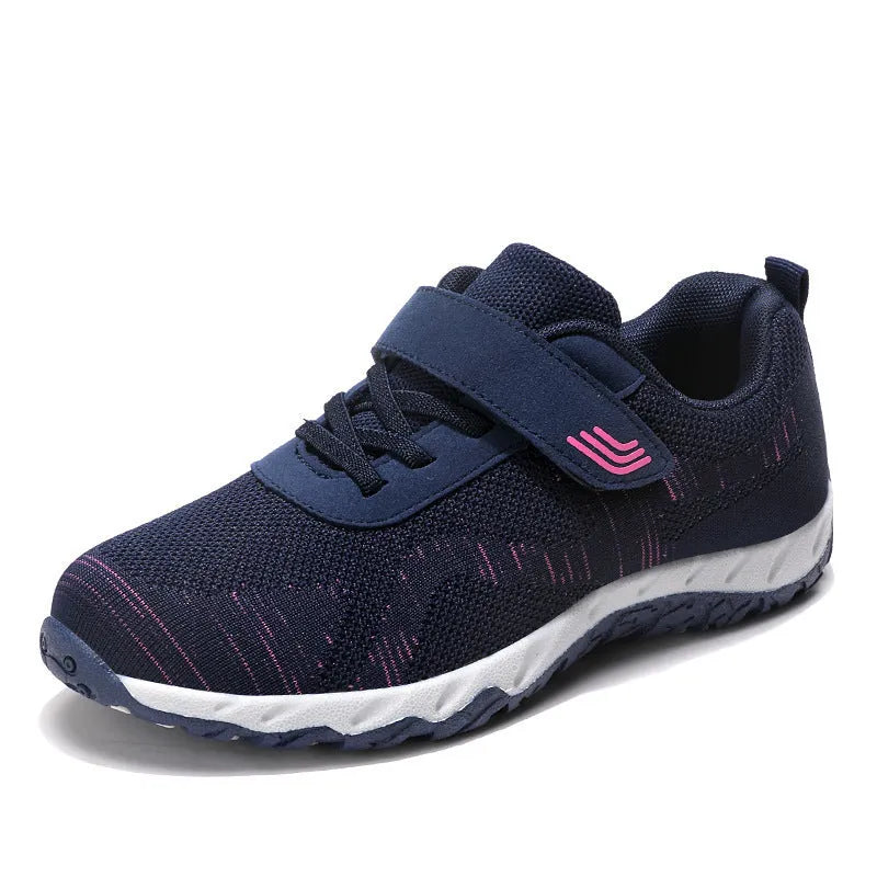 Women's grey purple soft sole velcro shoes with a low-top mesh upper and wedge heel.